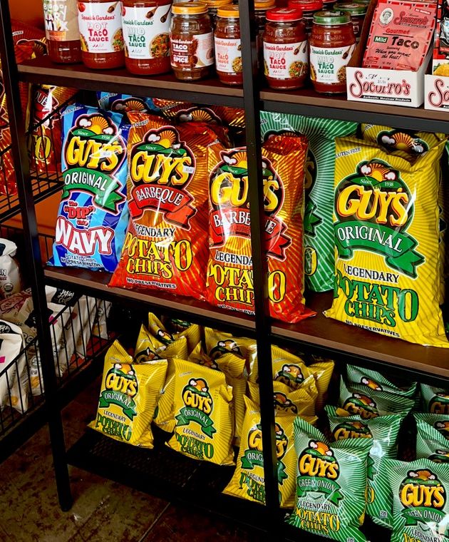 Guy’s Original, BBQ, Wavy and Green Onion chips on the shelf